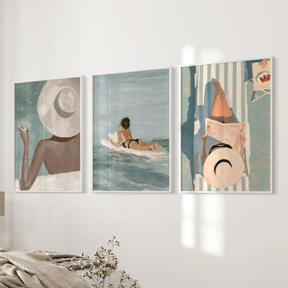 Mediterranean resort set of 3 wall decor prints is shown in white frames on a bedroom wall beside the bed.