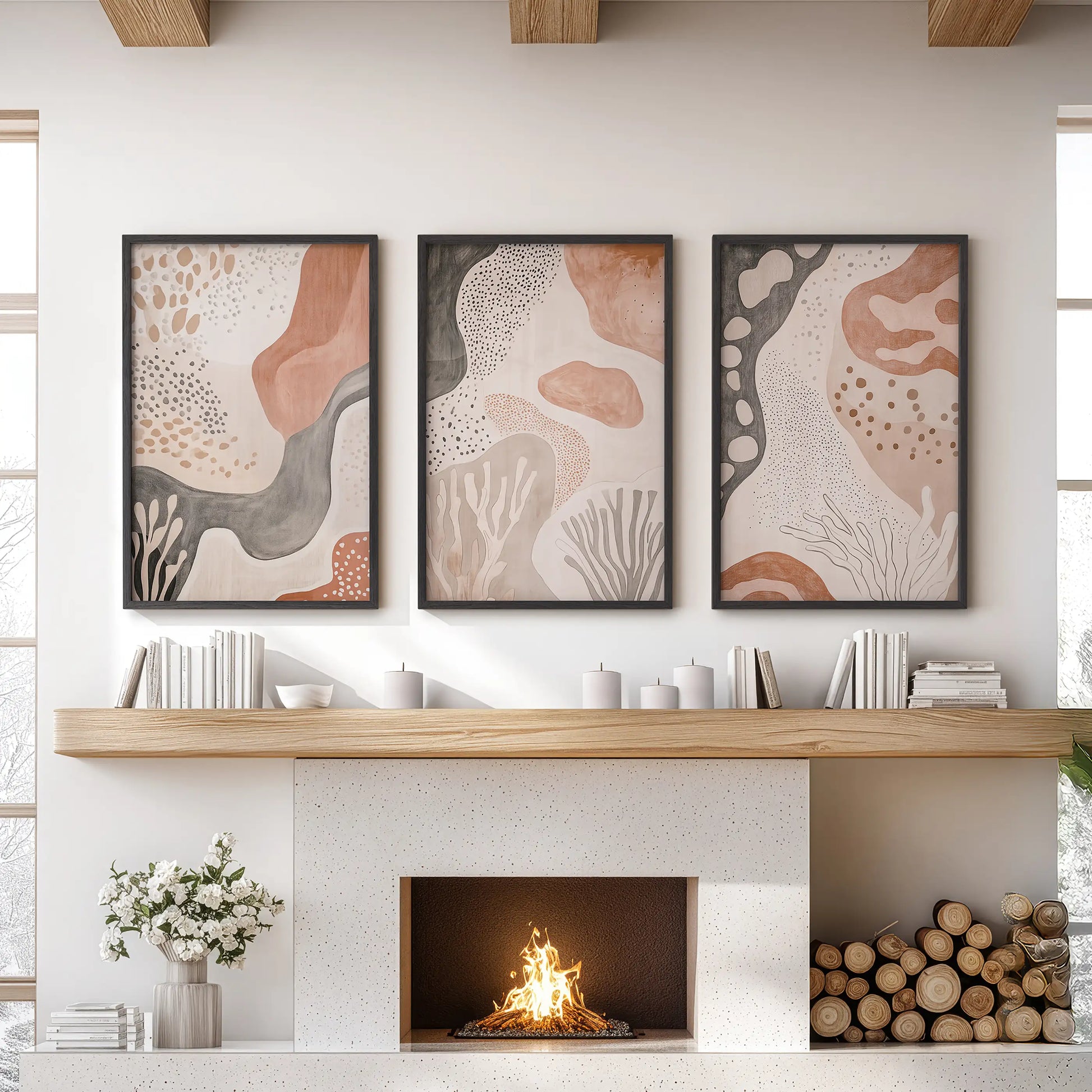 Terracotta geometric patterns, 3-piece wall art in black frames, styled over the fireplace mantel to anchor a relaxed lounge.