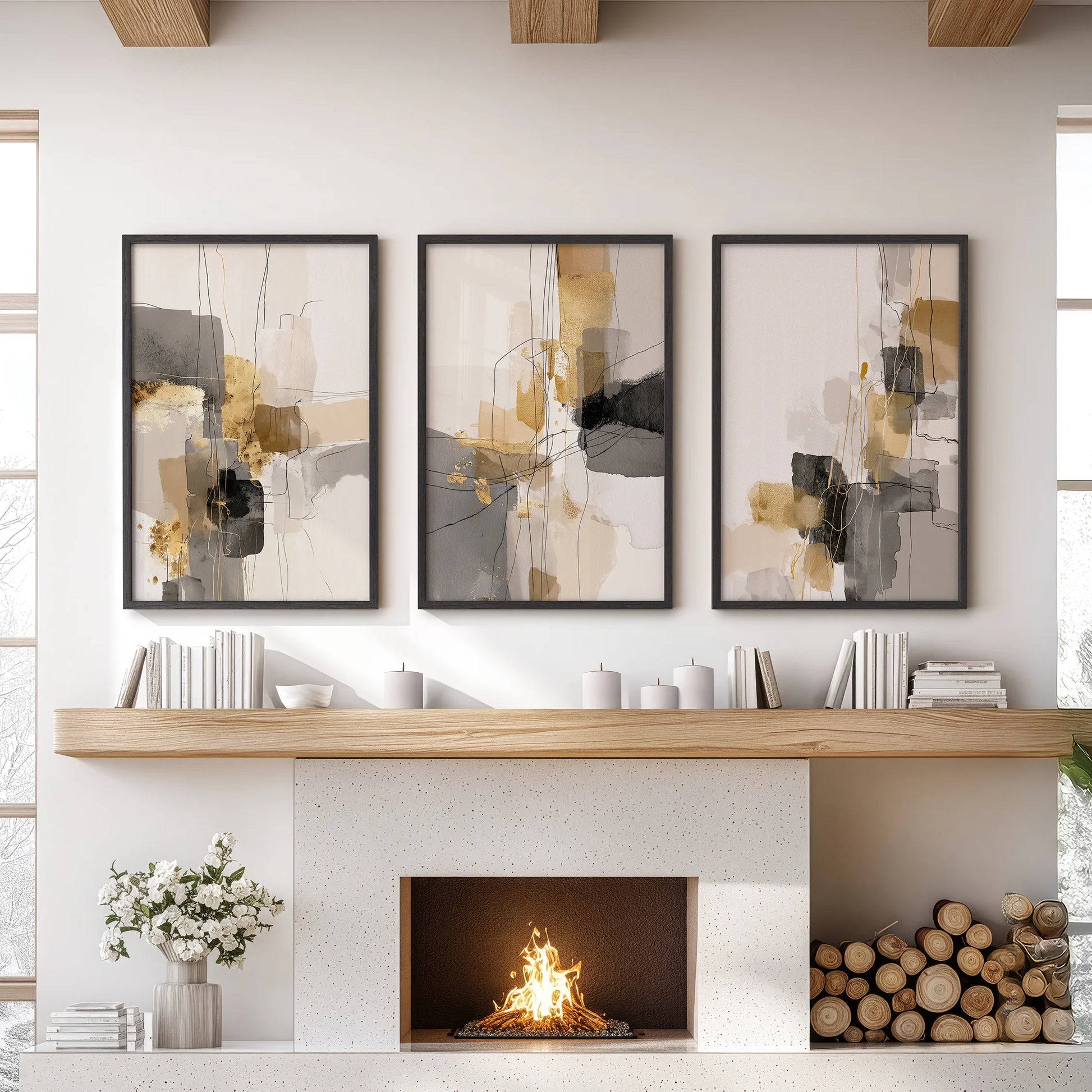 Black and gold brushstrokes, 3-piece wall art set, in slim black frames anchors a sitting room above the fireplace with modern, minimalist flair.