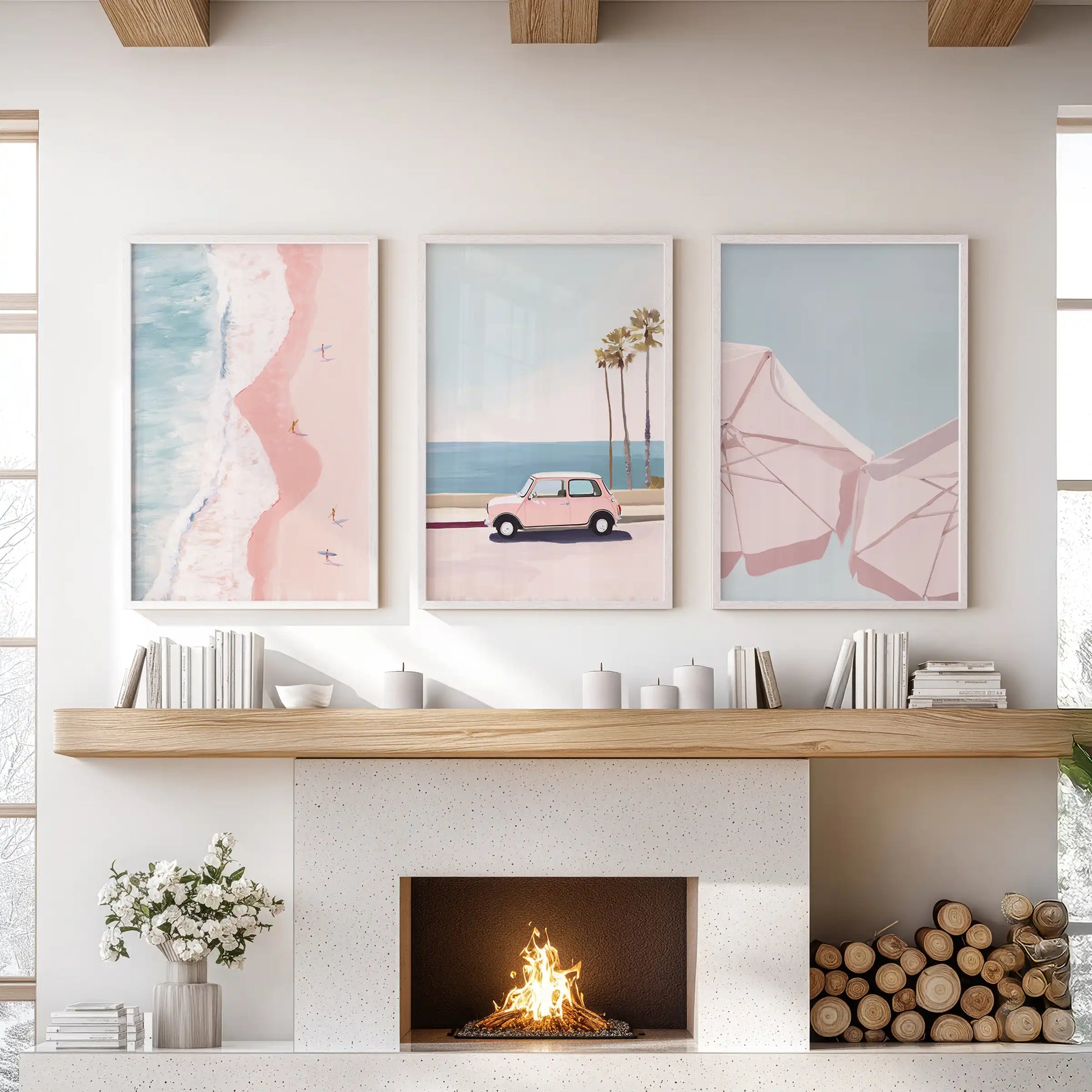 Minimalist beach landscapes, a gallery wall set of 3 in white frames, bring pared-back coastal art over the fireplace in the sitting room.