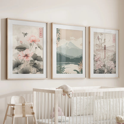 Japandi nature wall art of three pieces in matted oak frames rests above the nursery cot, softening the space with gentle organic forms.