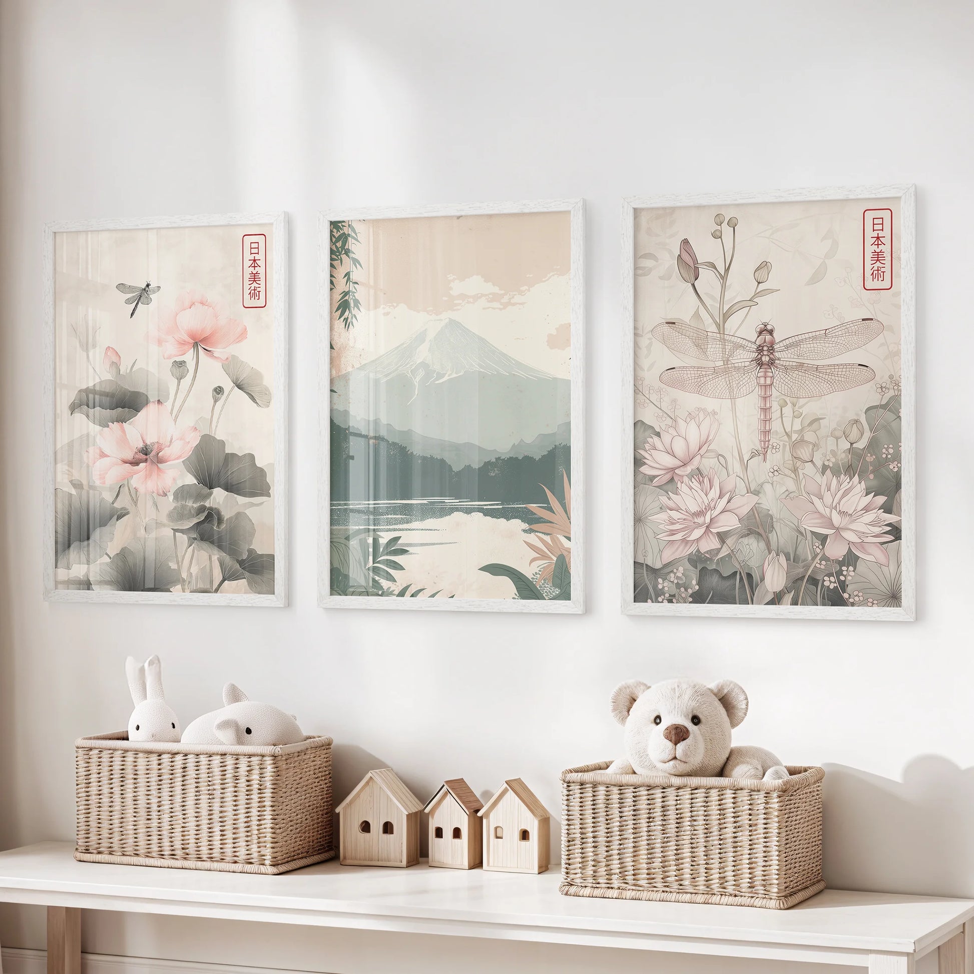 A trio of Japanese woodblock landscapes in white frames brightens the playroom wall with calm hues and balanced, orderly lines.
