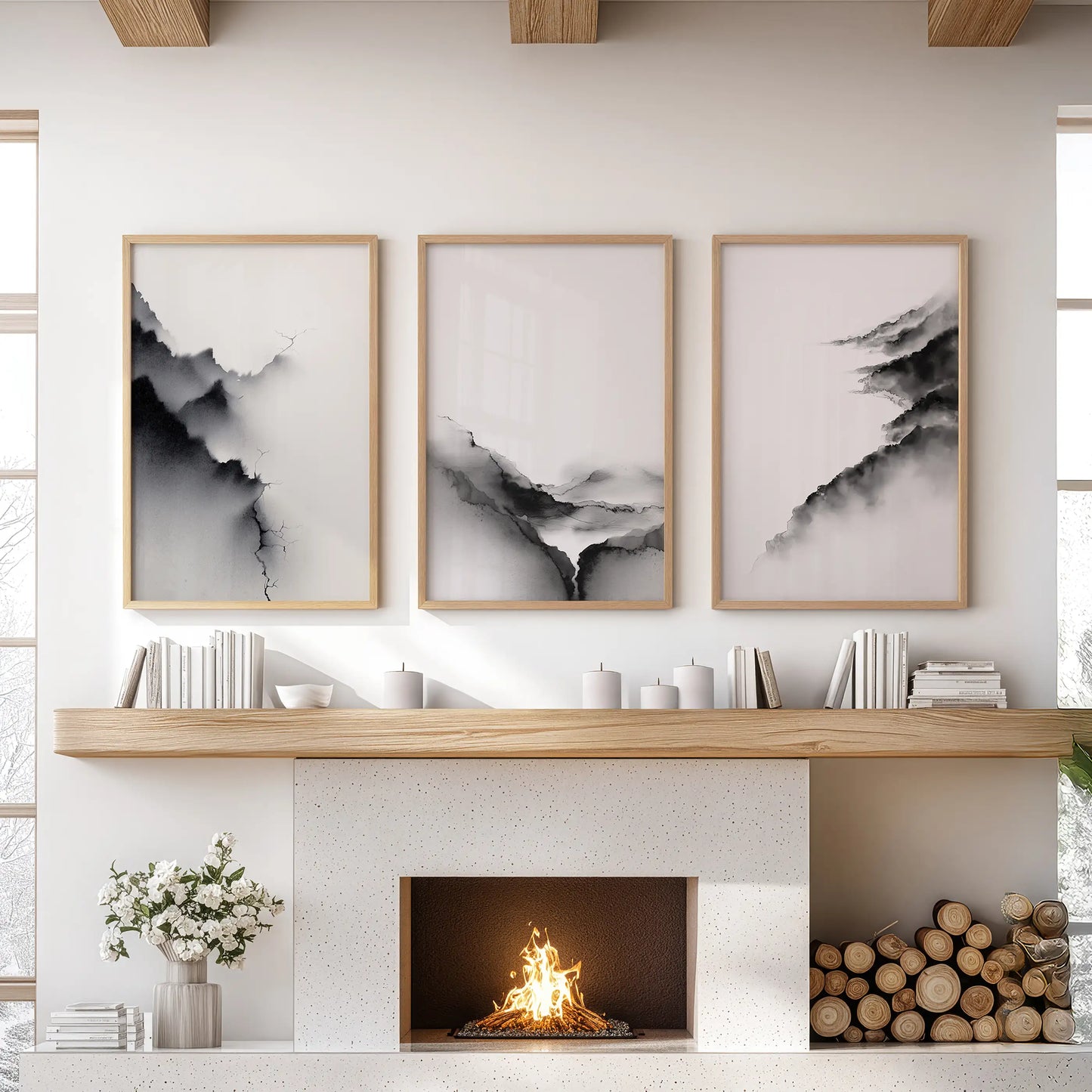 Black and white abstract mountains in a three-piece wall decor set, oak framed, crown the living room space above the fireplace mantel.
