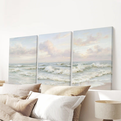Three gallery-wrapped ocean posters serve as minimalist wall art, centering the bedroom’s look above the headboard.