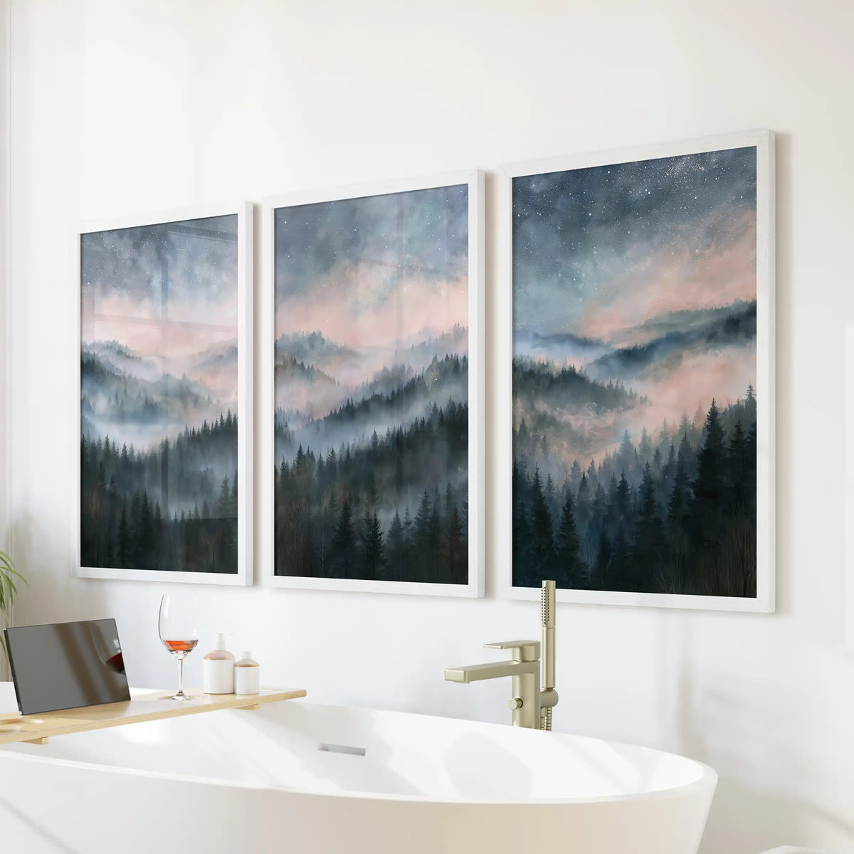 Watercolor alpine pines wall art, a three-piece set hung over the tub wall in the bathroom, finished in crisp white frames.