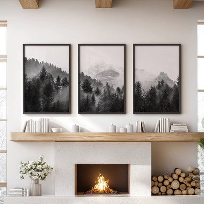 Three black-framed wall prints show a foggy pine forest, creating a soft landscape accent above a lounge mantle.