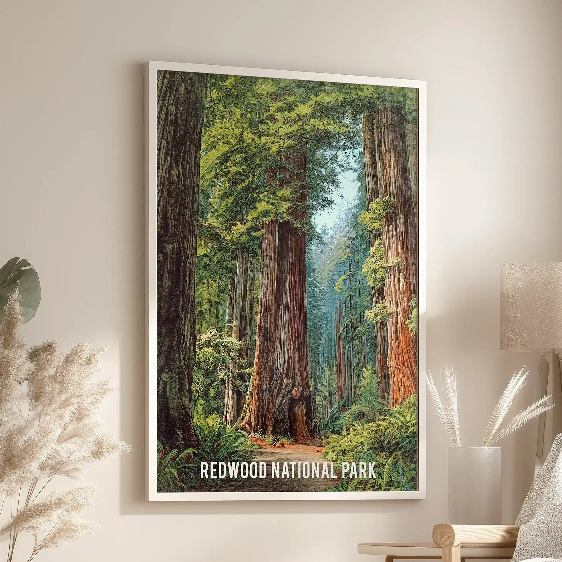 Misty woodland scenery statement art print hangs over a lounge armchair in a slim white frame, layering soft fog and towering trunks across your wall.