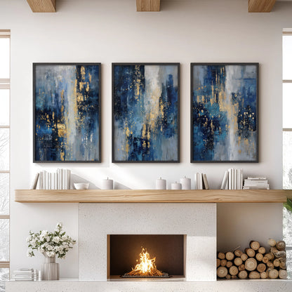 A modern three-panel wall art set with navy and gold brushstrokes stands in black frames above a fireplace mantel, grounding the lounge with bold contrast.