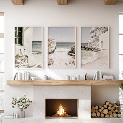 Greek seaside beaches, wall art 3 set in white framed finishes, anchors the lounge above the mantel with sun-washed neutrals and clean lines.