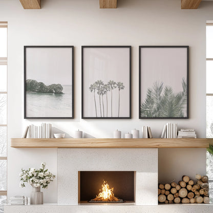 Boho palm trees wall art set of three anchors the sitting room, framed in black and hung above the fireplace mantel for an airy coastal feel.