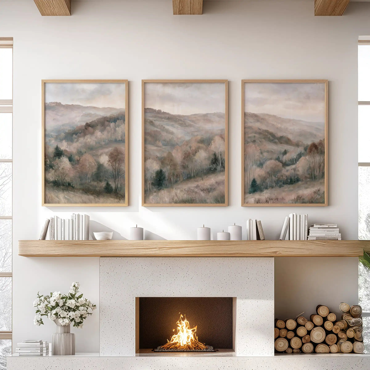 Muted landscape watercolor prints, a three-piece wall decor set, anchor the sitting room over the mantle in natural oak frames.