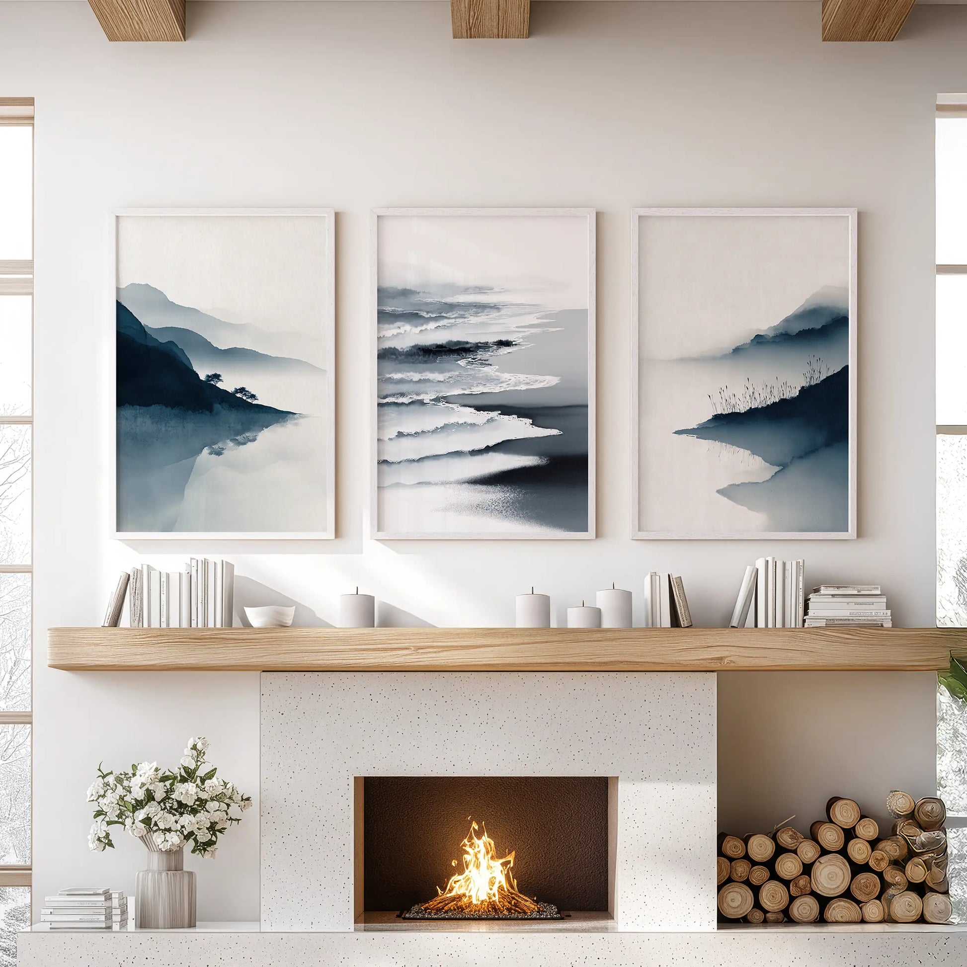 Coastal abstract wave art presented as three white-framed prints centers the living room mantle with a gentle modern rhythm.