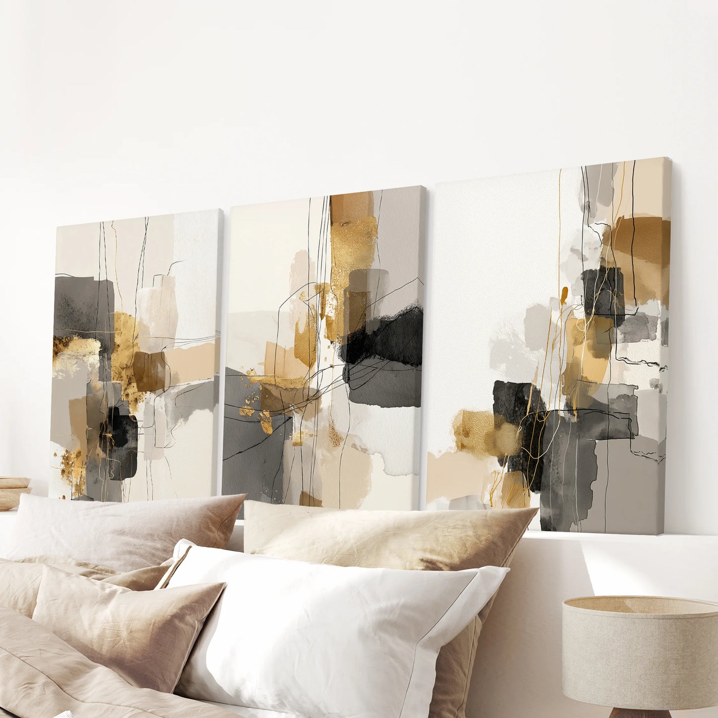 A wall-hanging set of three canvas art prints with watercolor abstractions drifts peacefully above the bed for a gallery-style finish.