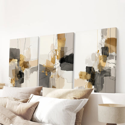 A wall-hanging set of three canvas art prints with watercolor abstractions drifts peacefully above the bed for a gallery-style finish.