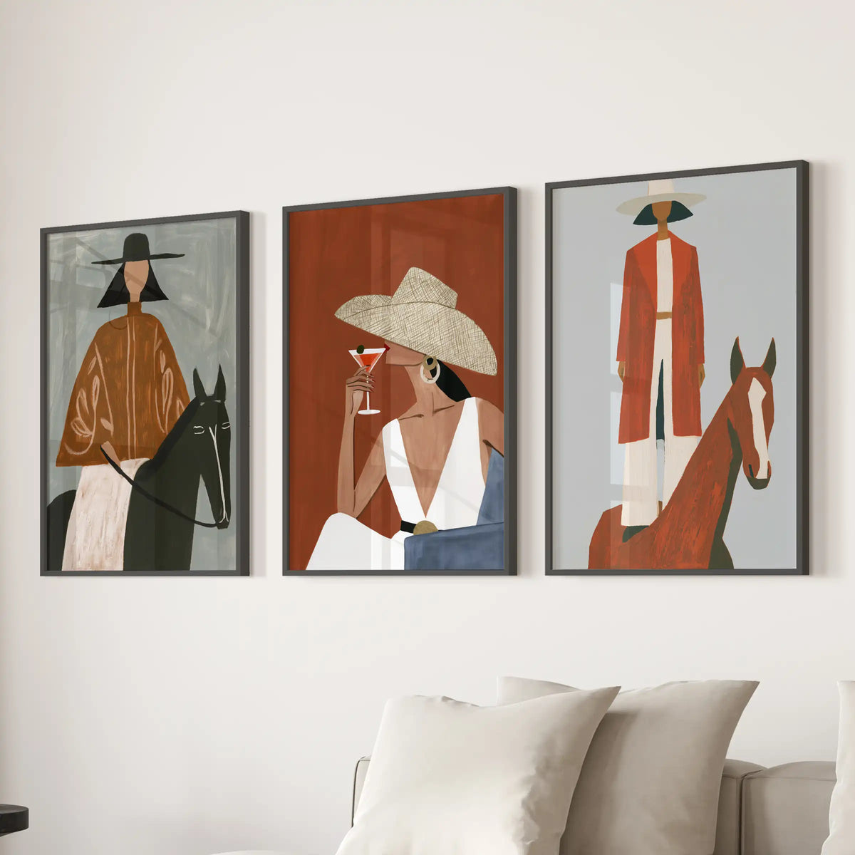 Black-framed wall art in a set of three shows horse and rider scenes above the living room sectional, bringing bold ranch character.