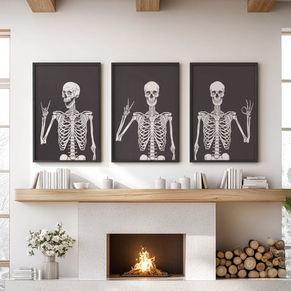 Funny skeletons, a 3-piece wall art set, grin from black frames over the mantel in the family room, adding playful Halloween charm.