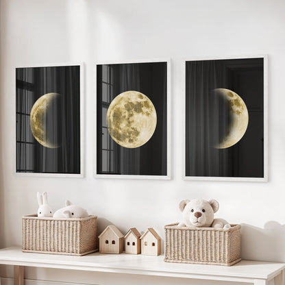 A three-print wall set of moon surfaces in white frames brings quiet wonder and bright ease to a child’s room decor.