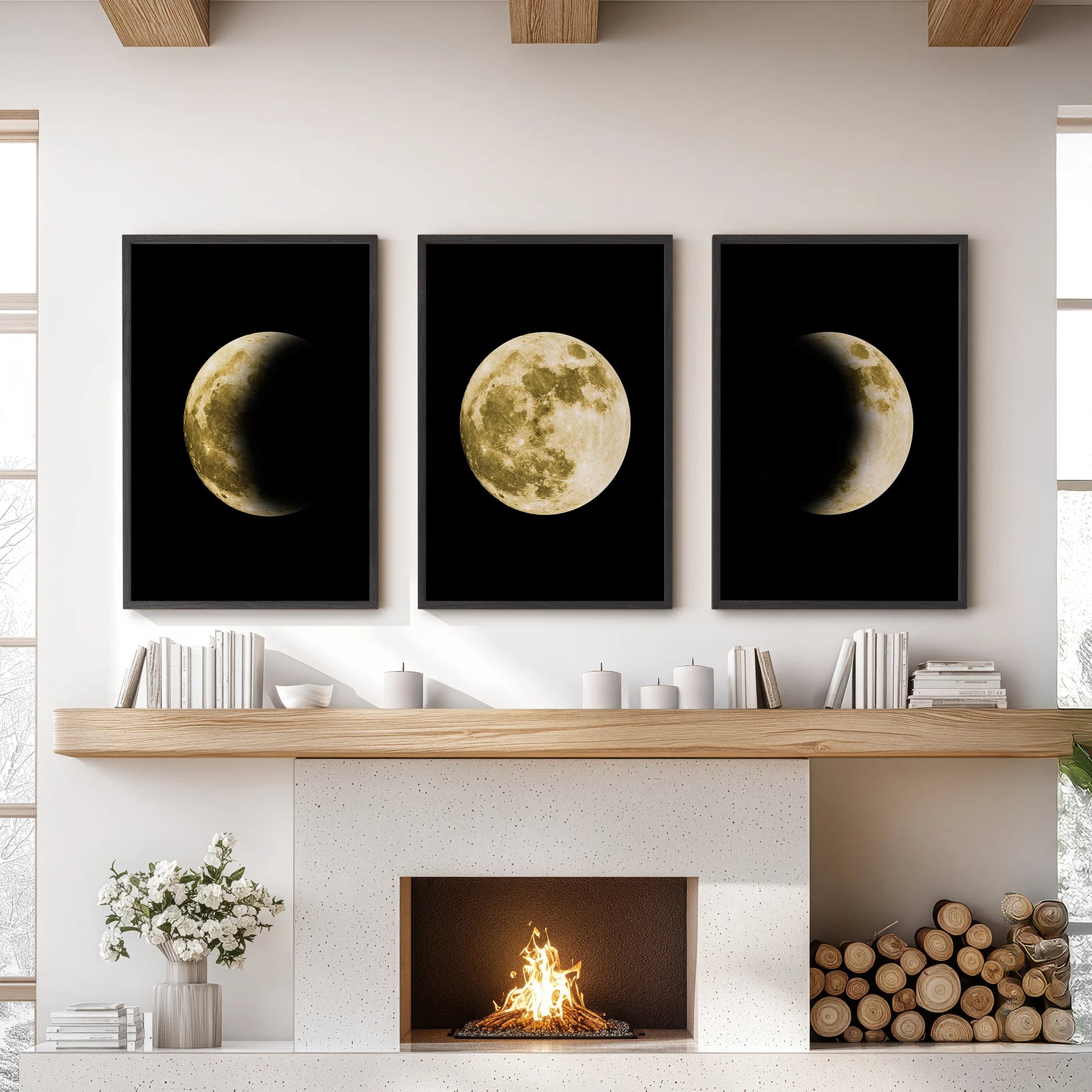Gold moon phases triptych, set of 3 wall prints in black frames, hangs above the hearth in a sitting room, bringing warm lunar art to the space.