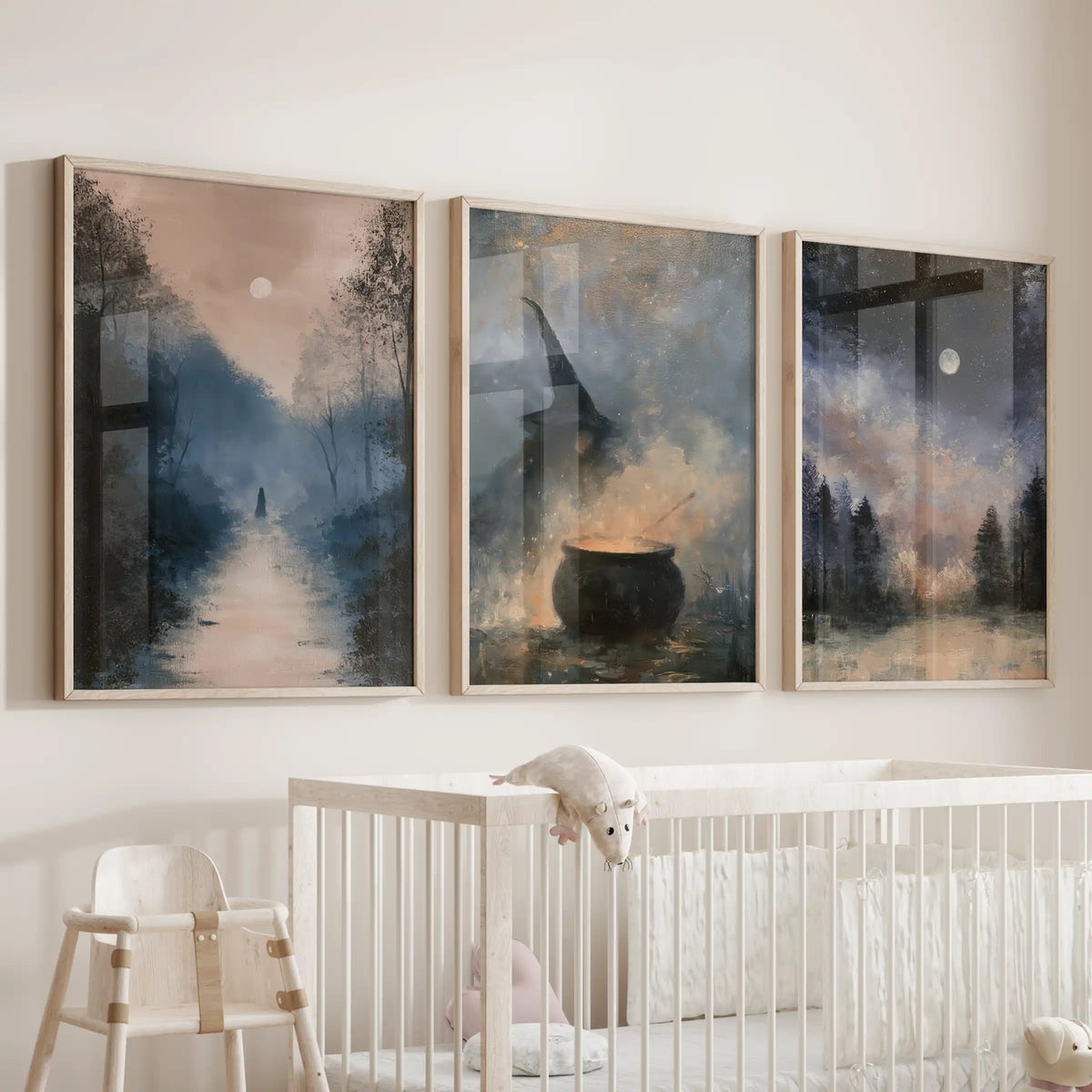 Enchanted woodland wall art comes as three prints in light oak frames, softly arranged above the crib for a storybook hush in the baby room.