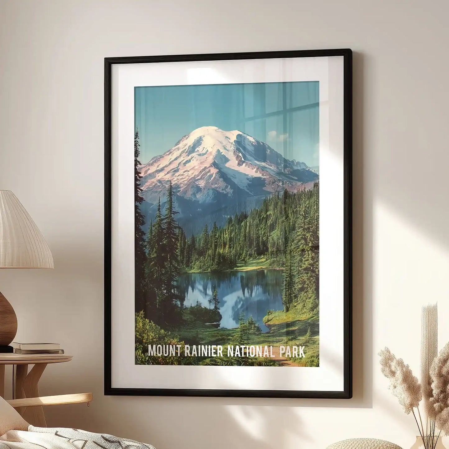 Carbon Glacier vista standalone poster, presented as a black matted framed print, sits beside the window chair to bring national park drama to the living room.