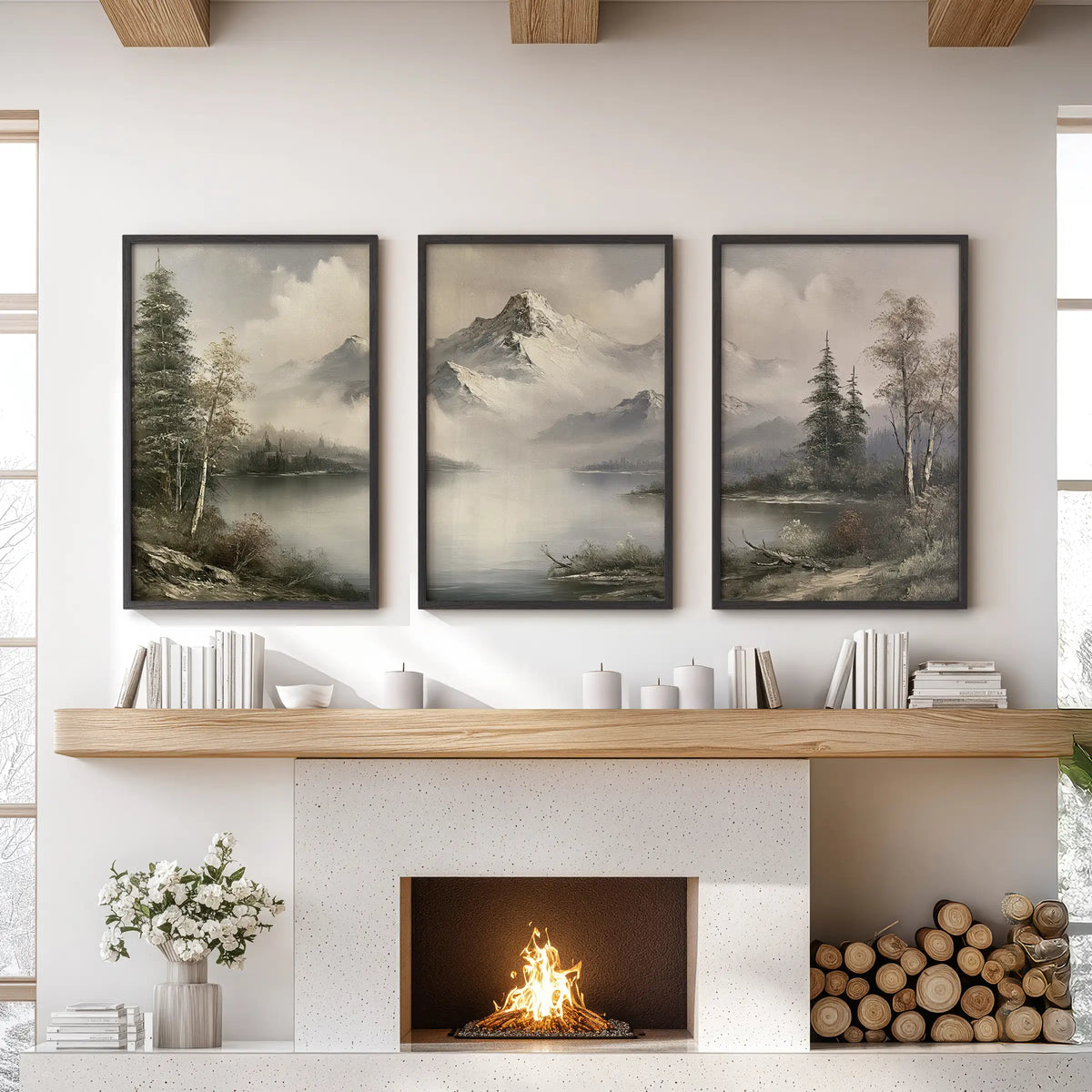 Three-poster wall art set featuring a mountain cabin landscape in black frames, displayed over a lounge fireplace.