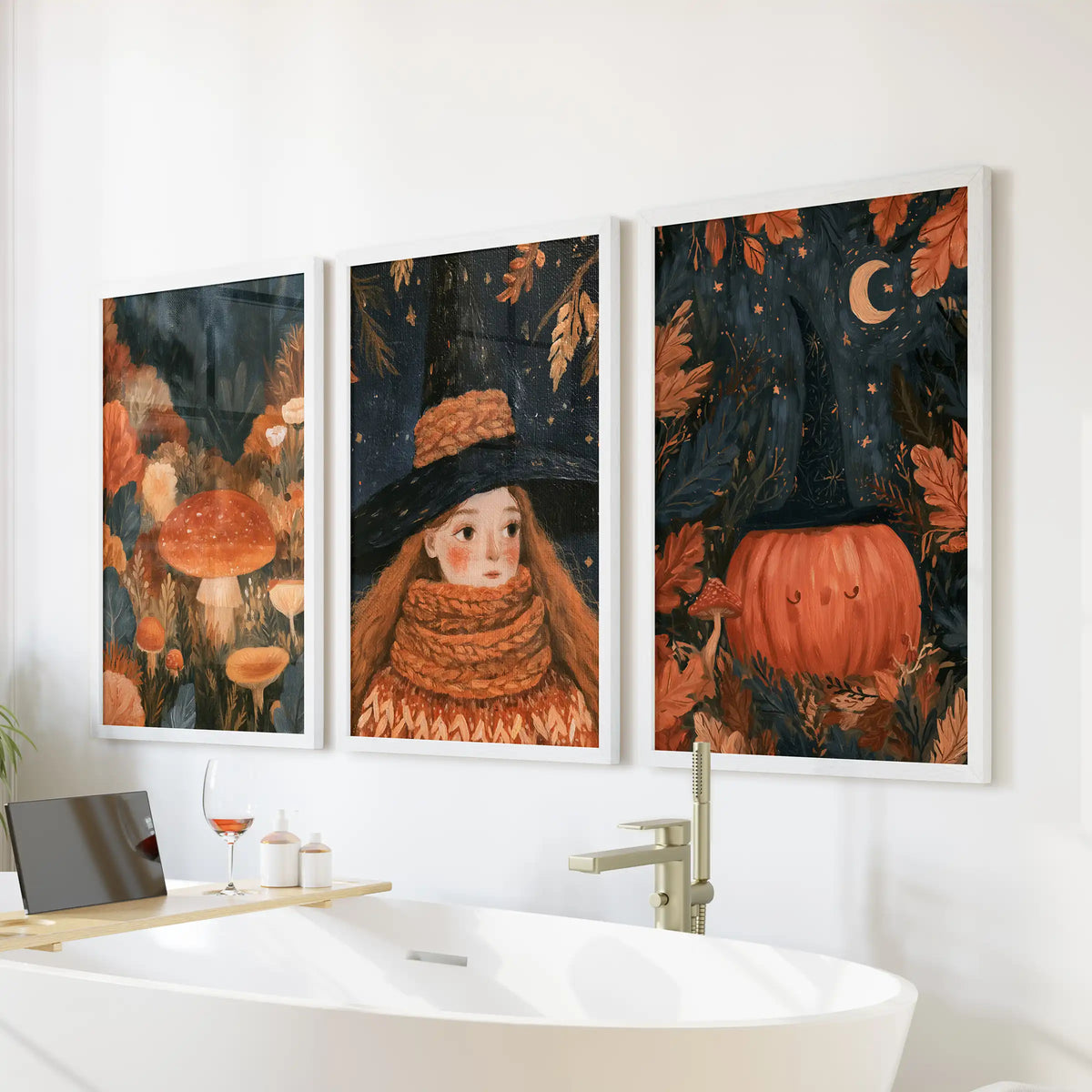Mushrooms and pumpkins fill a three-piece wall art display in crisp white frames, adding a cozy fall forest mood above the bathroom tub.