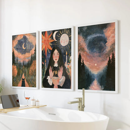 Moon phases over forest wall art trio set in white frames rests above the tub wall, bringing a serene celestial hush to the bathroom.