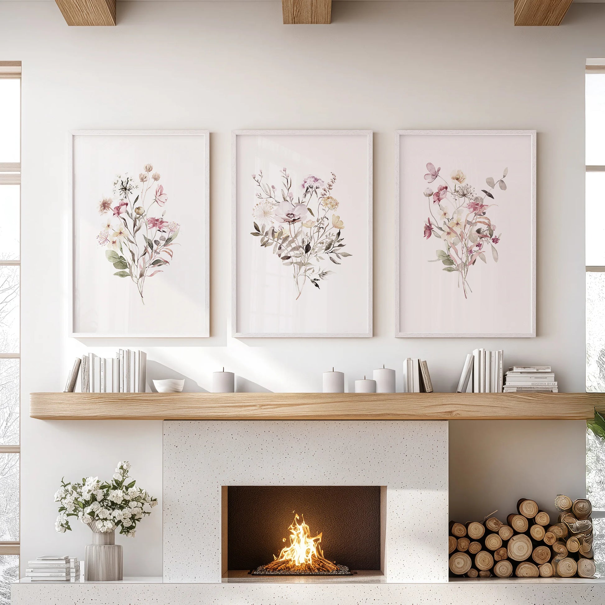 Botanical florals, a set of 3 white-framed wall art prints, styled over the fireplace to anchor a calm lounge.