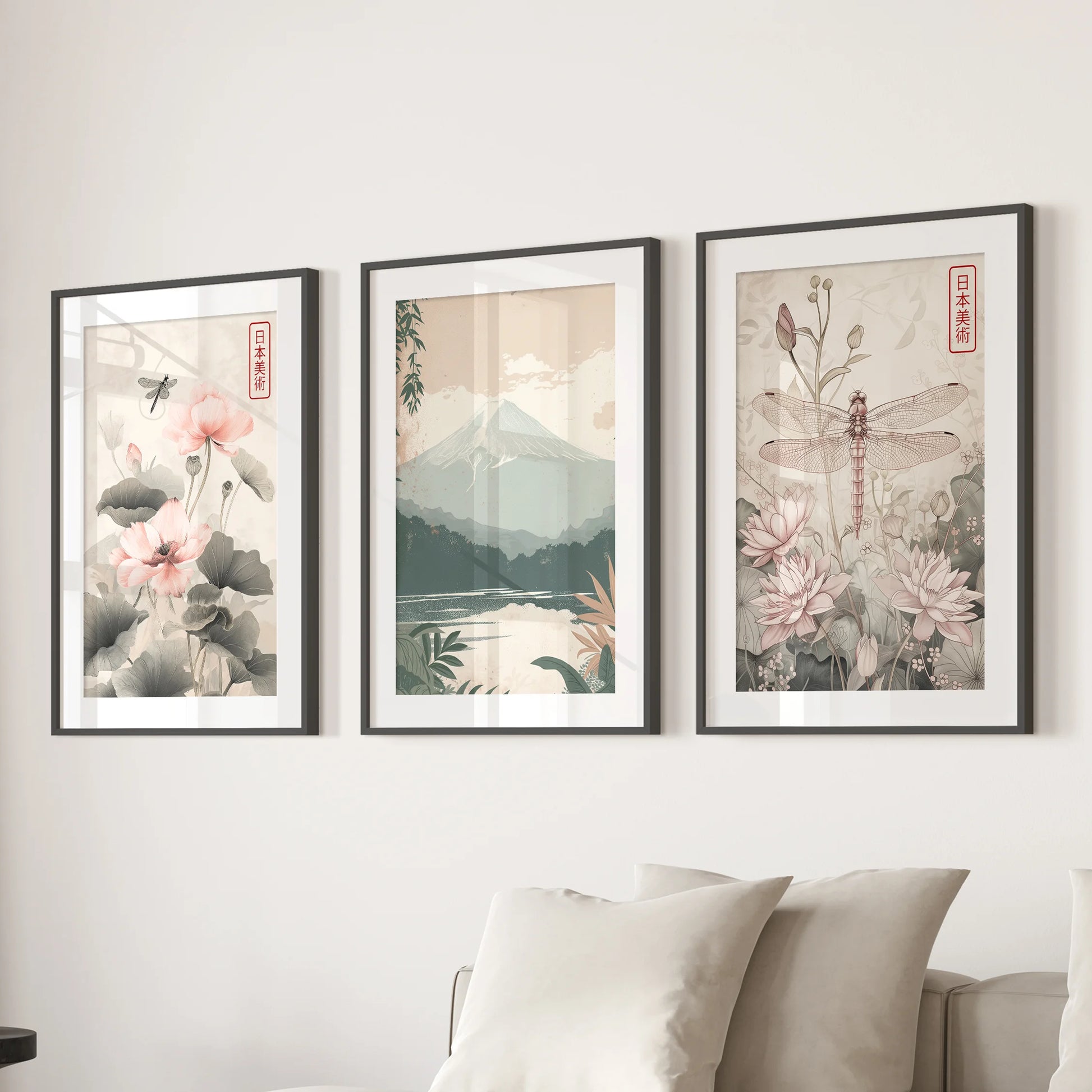 Lotus pond botanicals triptych in black frames with mats, floating above the family-room sectional sofa for a soft, nature-forward gallery moment.