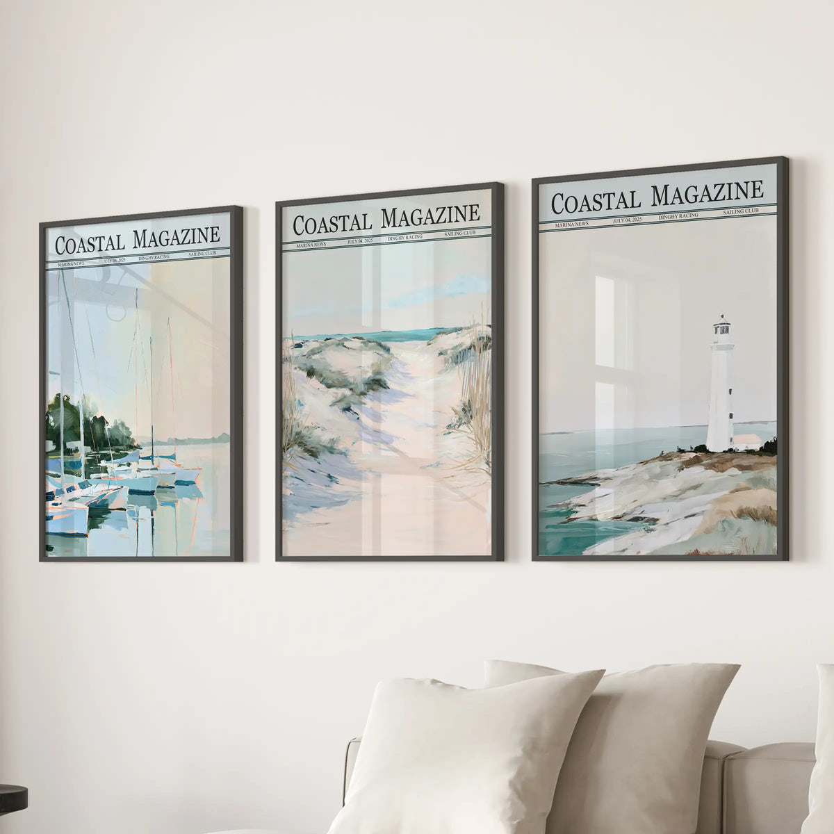 Sailboat marina wall art set of 3 in black frames, arranged over a sectional in a living room with coastal views including dunes and a lighthouse.