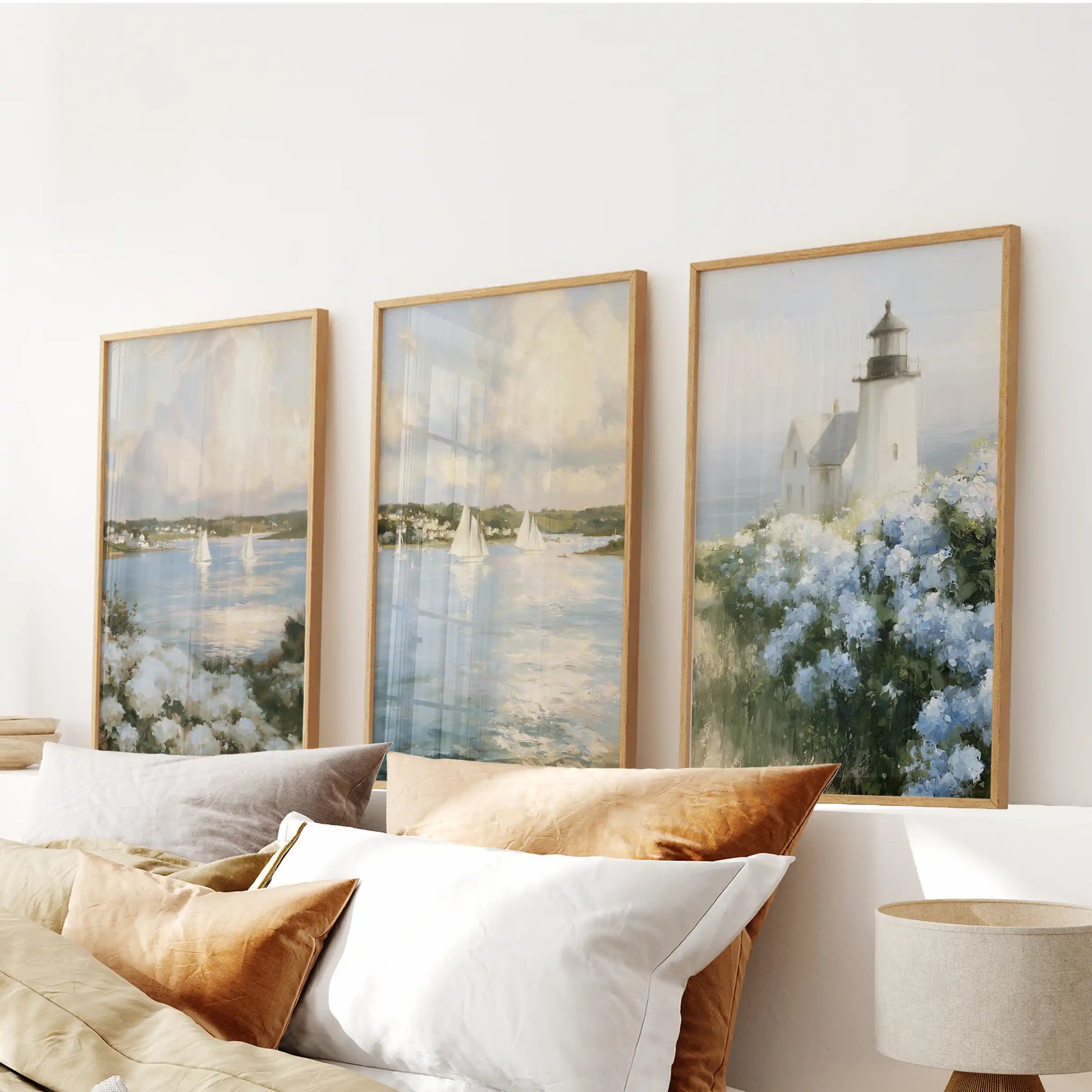 Blue and white hydrangeas 3-piece art print set, in thin wood frames, brings a crisp coastal flourish to the bedroom over the headboard.