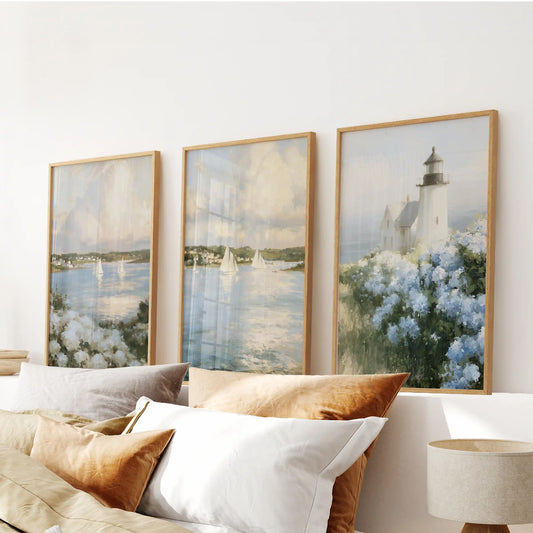 Blue and white hydrangeas 3-piece art print set, in thin wood frames, brings a crisp coastal flourish to the bedroom over the headboard.