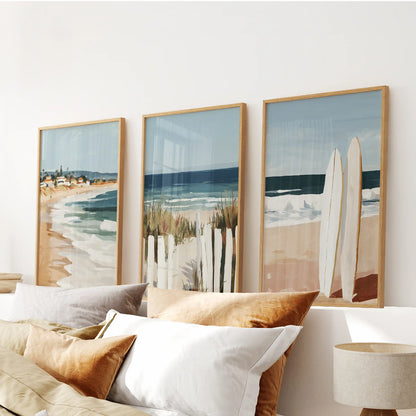 Rolling ocean waves three-piece wall art set in oak wood frames crests above the bed, a soothing note for the bedroom.
