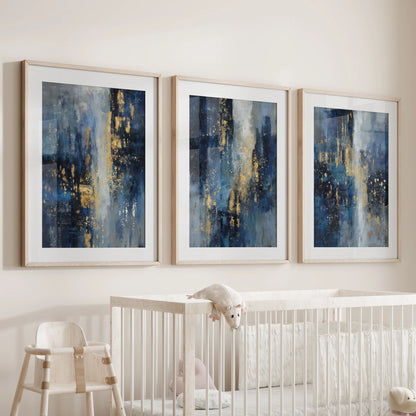 Natural wood-framed wall art in blue and gold hues hangs as a 3-piece set over the crib, bringing gentle calm to the infant room.