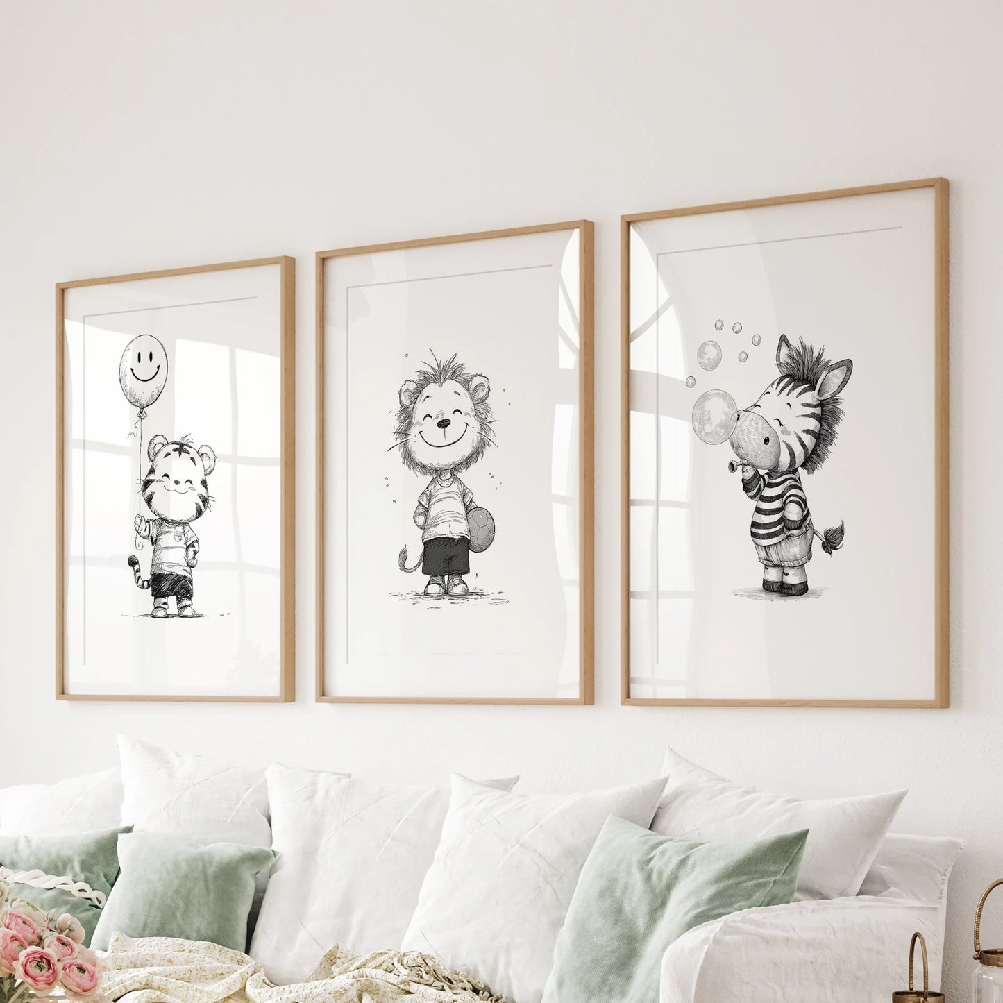 Lion, tiger, and zebra cubs, three-piece pictures in oak frames with mats, floating above the lounge sectional sofa for a clean, gallery look.