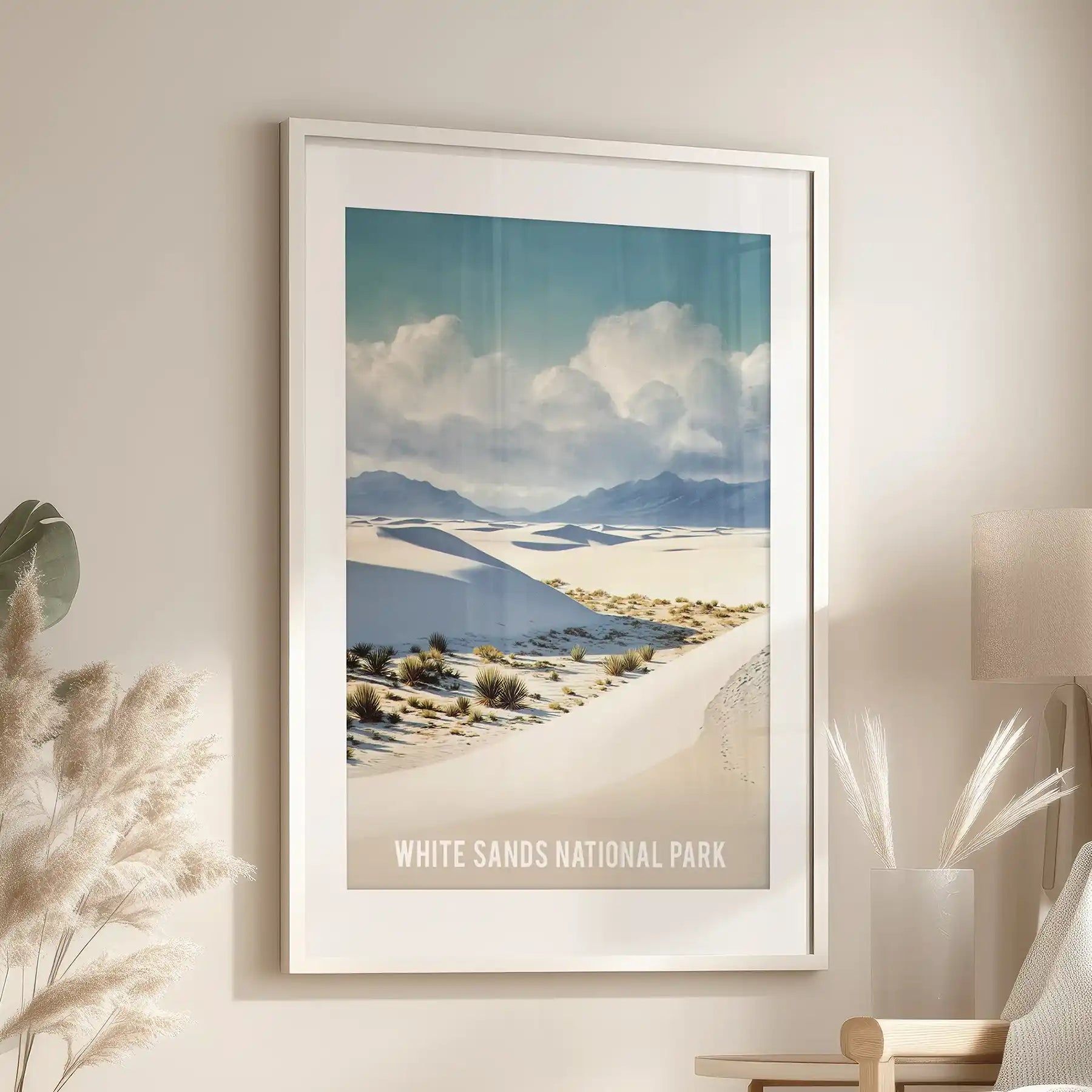 New Mexico desert dunes statement poster anchors the living room, mounted above an armchair in a white frame with mat for a tailored finish.