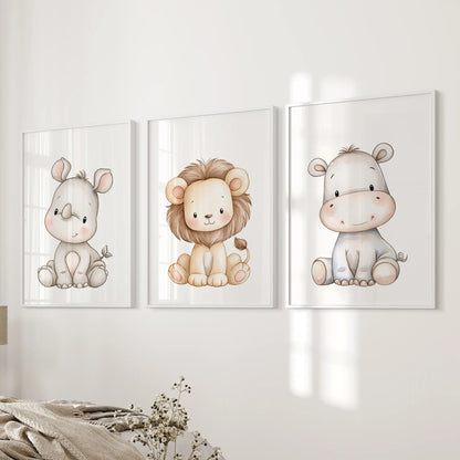 Three prints of a baby rhino, lion and hippo hang beside a bed in white frames.