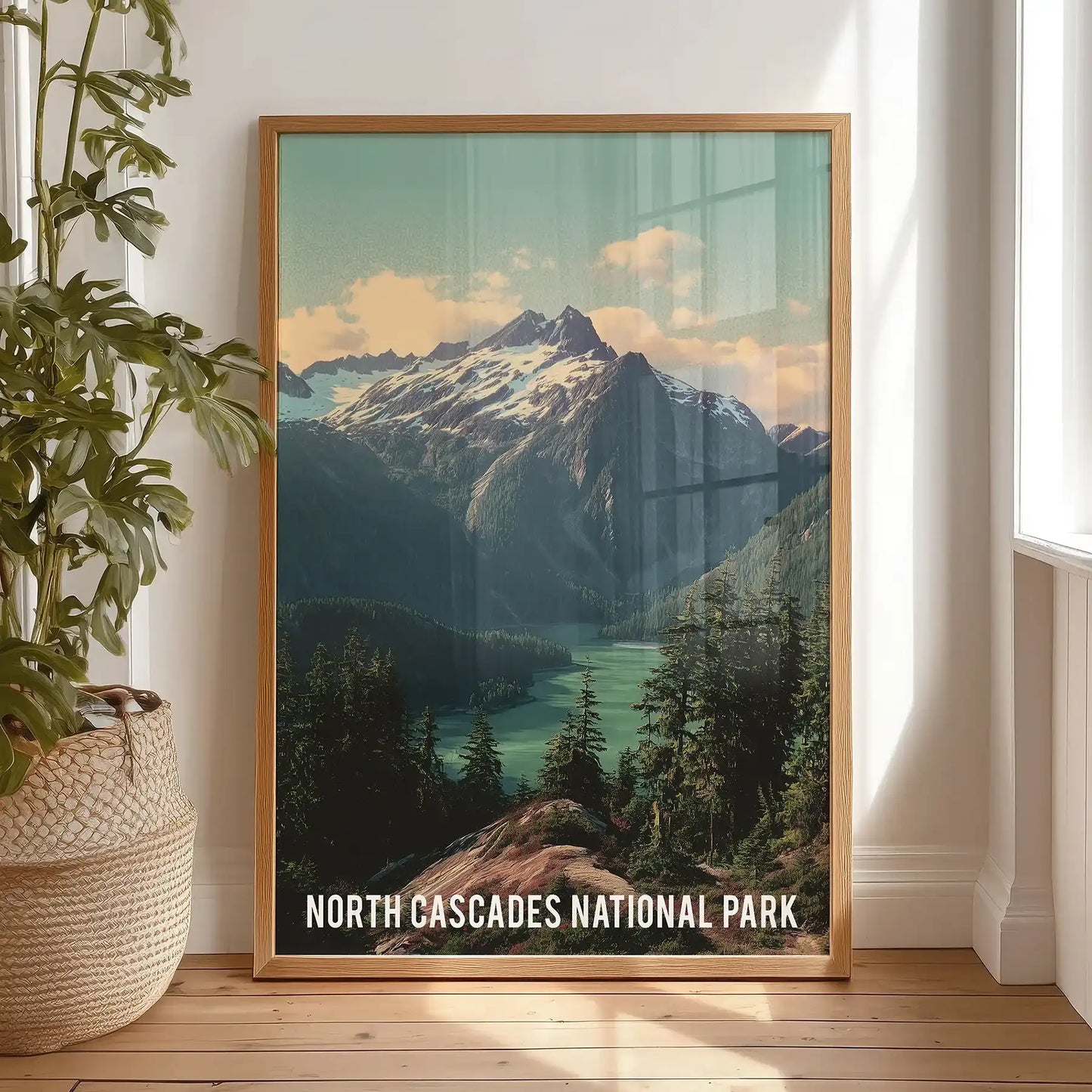 Evergreen forest landscape single-panel wall art in a light wood frame leans against the bedroom wall, bringing soft Cascades greens to a restful corner.