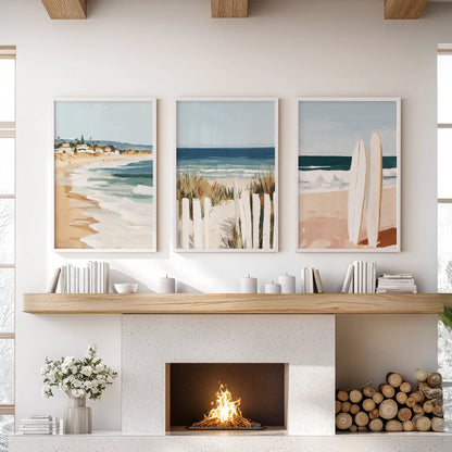 Coastal seascape white framed prints crest above the mantelpiece as a set of three, giving the lounge an airy, tide-washed focal point.