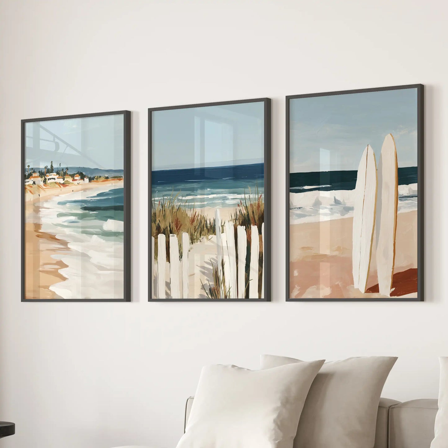 Black-framed coastal prints make up this three-piece wall art set, adding a sandy shoreline calm above the sectional in the sitting room.