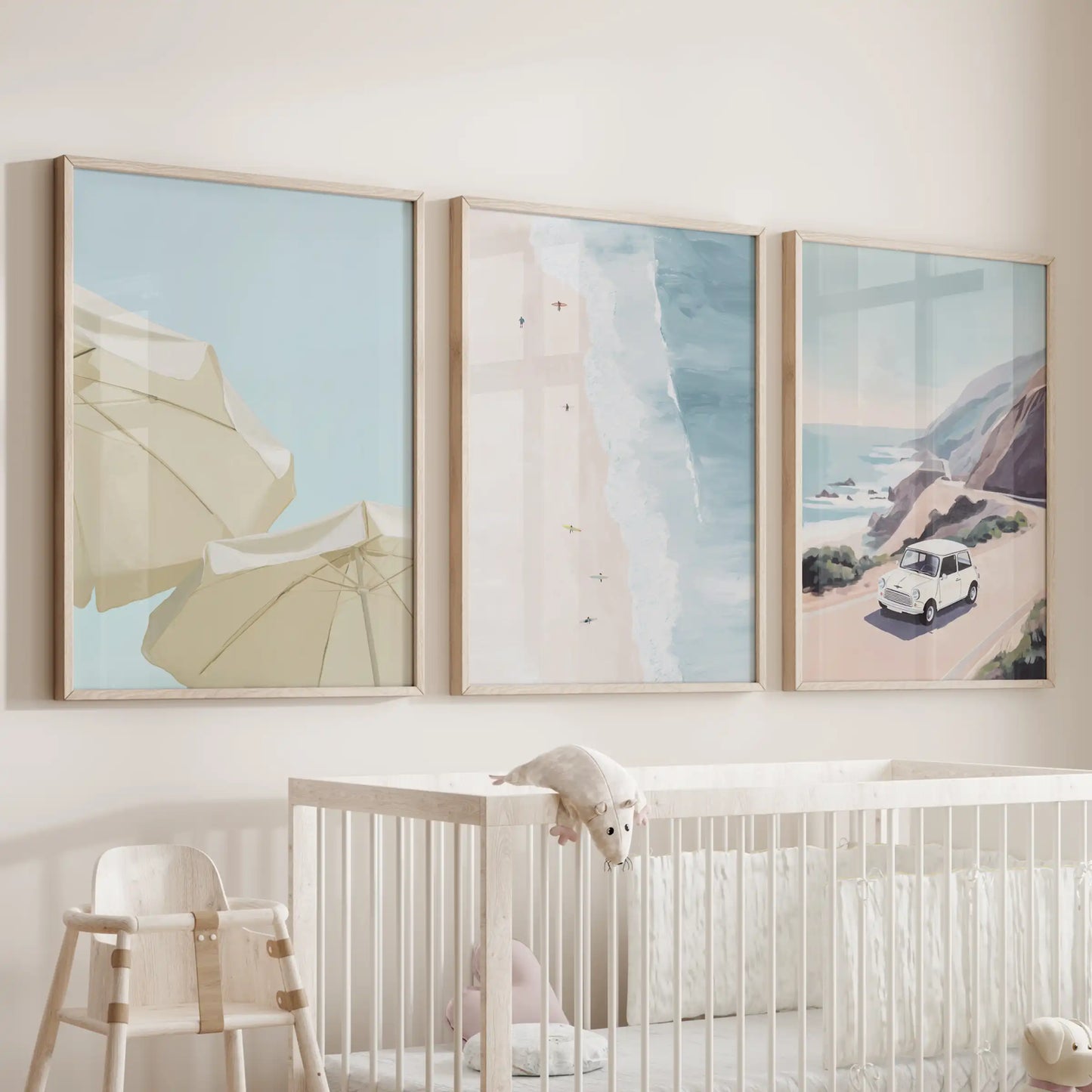 Summer beach lifestyle art, three wood-framed prints, brings lighthearted coastal energy to a baby nursery over the cot.