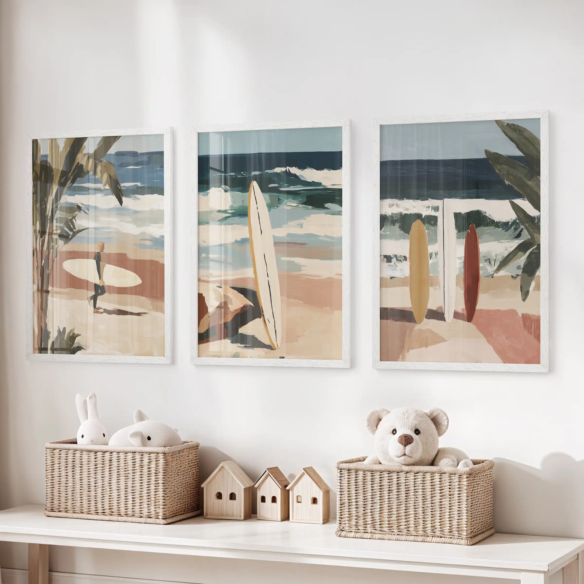 Coastal beach scenes 3-piece wall art in white framed prints hangs over the toy organizer, brightening the playroom with dunes, shells, and sky.