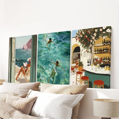 Gallery-wrapped triptych of ocean swimmer art hangs over the bed’s headboard, a clean, modern nod to the coast.