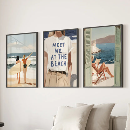 Behind the family room sofa, a three-print wall art set of seaside umbrellas and loungers adds breezy beachfront color in sleek black frames.