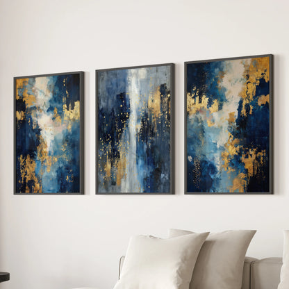 A modern triptych of black-framed navy abstracts makes a 3-piece wall art set styling the living-room space above the couch with gallery refinement.
