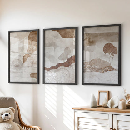 Organic forms in warm neutrals set of three posters, framed in black, bring soft texture and playful calm to a kids playroom over the chest of drawers.