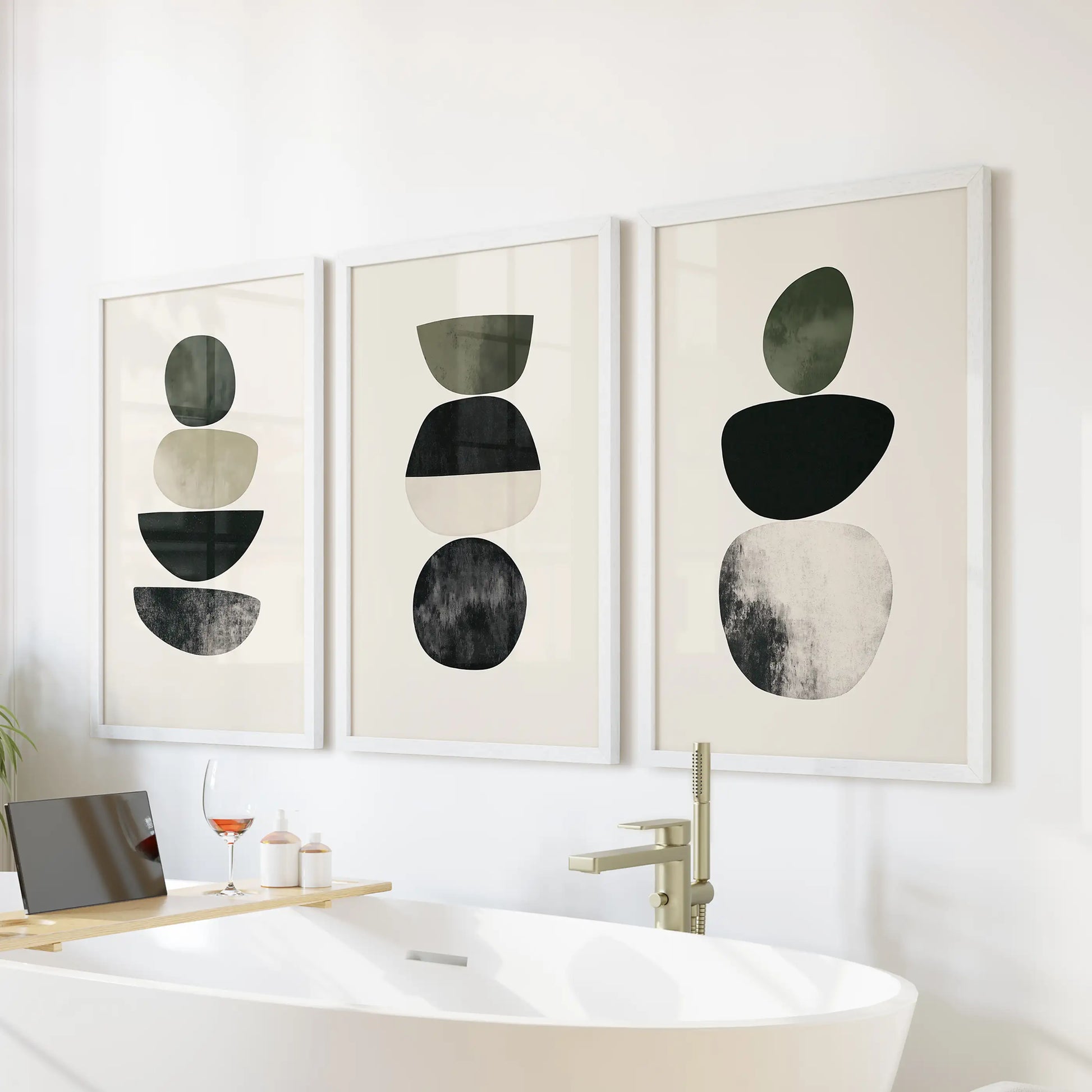 Earth-tone geometric shapes three-piece wall art set in white frames suits the bathroom, hanging above the bathtub wall for a serene, spa-like note.