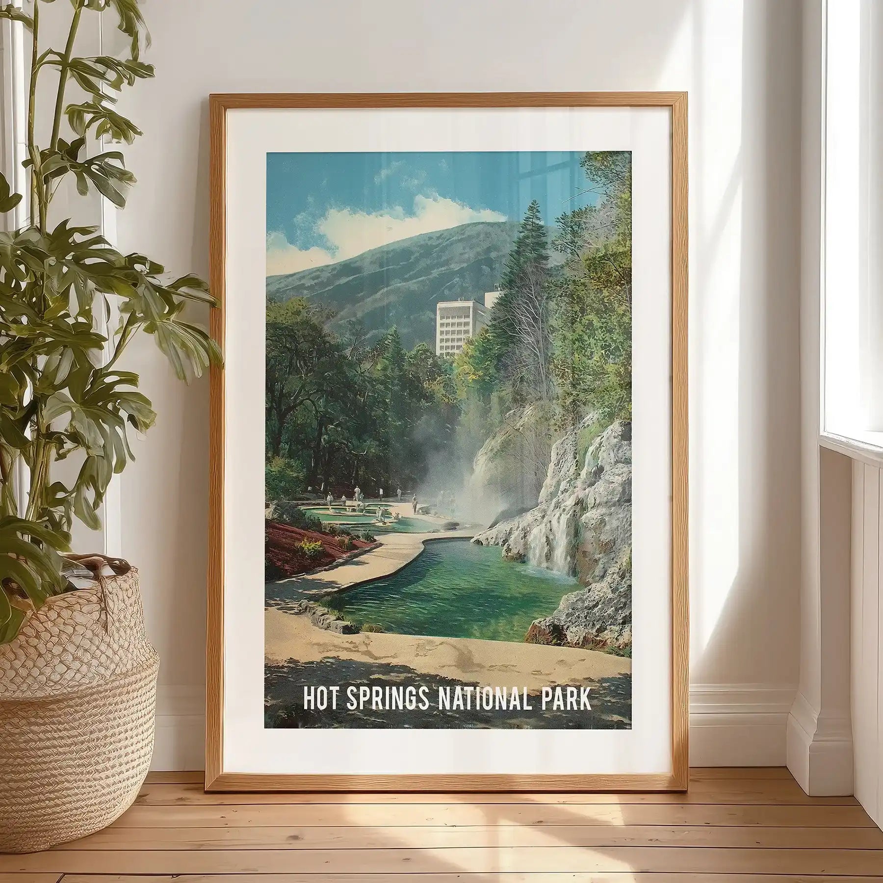 Hot Springs National Park scene single poster print in a black frame with mat fits the bedroom, standing on the floor for a relaxed, curated feel.