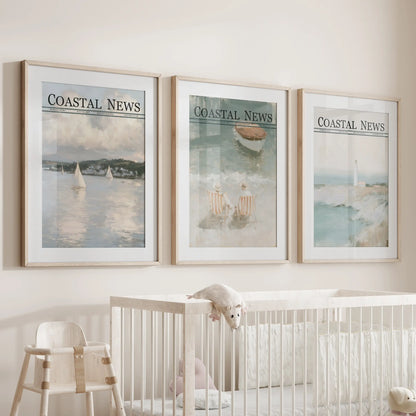 Coastal landscapes form a set of three wall prints in matted wood frames, displayed over a cot in an infant room.
