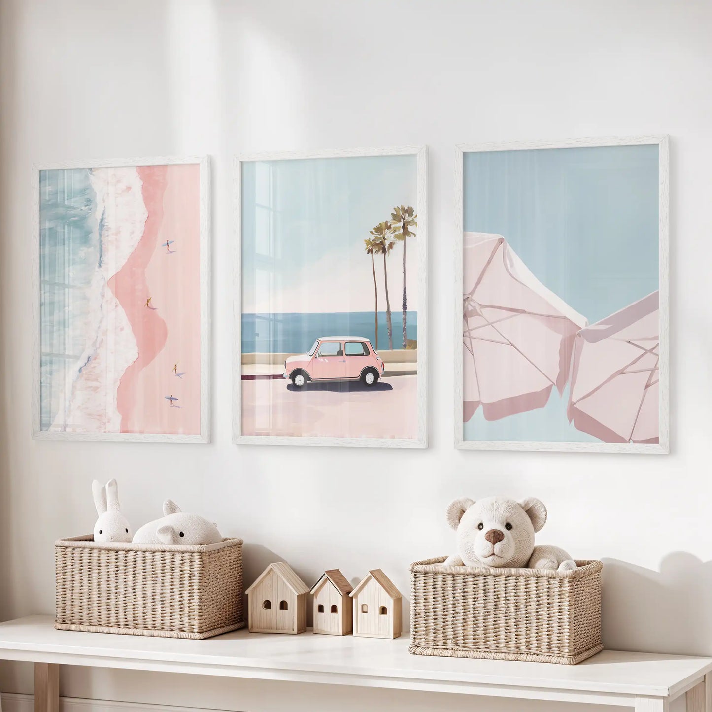 A serene 3-print beach art set in clean white frames drifts quietly above the toy organizer in the children’s room.